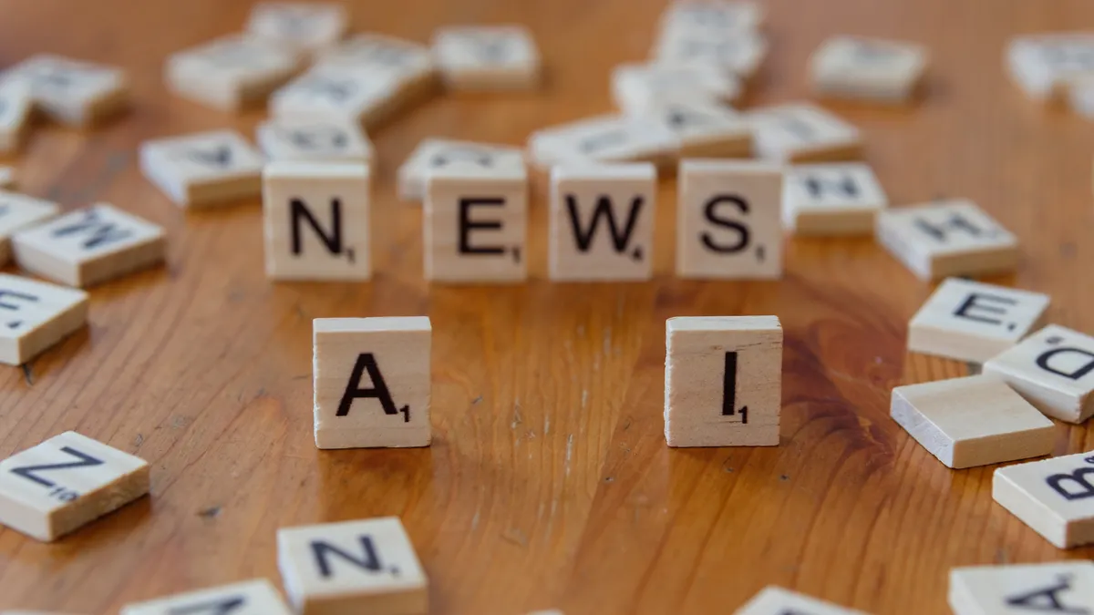 Automating publishing with AI-generated articles and human review checkpoints — AI News Concept with Scrabble Letters