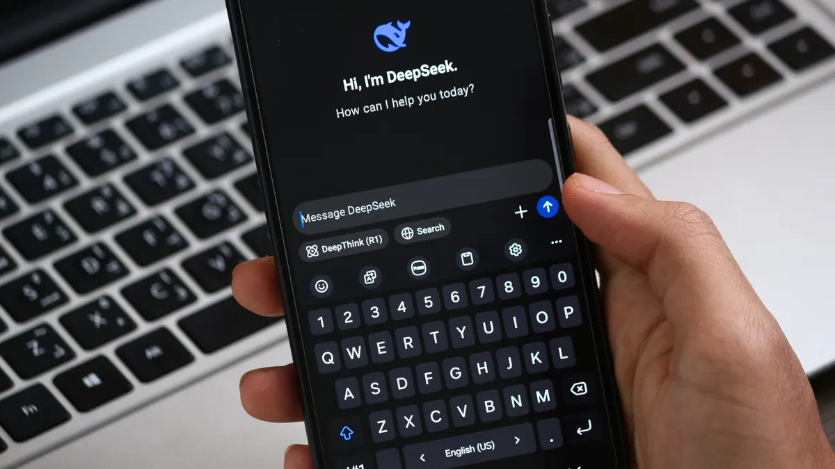 How to optimize AI-generated articles for human readers and search engines — Person Holding Smartphone with AI Chat Inte